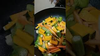 cooking steam fish along with okra pumpkin with water cracker hellshire style