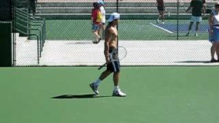 David Ferrer sunbathing at practice