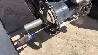 How to tighten the chain on a Yamaha raptor 700/700R