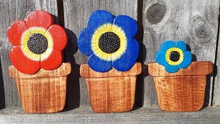 flower in a Pot..made on fencing wood, router, scroll saw, dremel project...