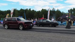 Audi Coupe 2.2TQ 20v PTE 6266 vs Jeep Grand Cherokee 6.1 Kompressor 1/4 mile drag race