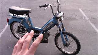 Peugeot 103 70cc, saves gas and hauls...