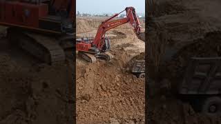 470 exvator machine cutting topsoil