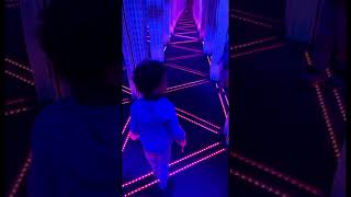 A kid lost in a mirror maze