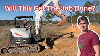 Hauling in Reinforcements!  Working on the Pond!