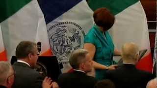 Christine Quinn handing Liam Neeson his award in NYC 3/18/2013