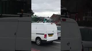 12 Wheeler Mercedes semi Flatbed truck carrying a container