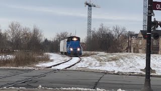 Southbound OBRY crossing Queen st in Downtown Brampton W/ 2 empty covered hoppers. 01.07.2020