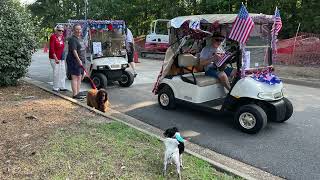 Parade 🇺🇸 Liddle Citizen dog follows golf carts dressed up 4th Of July holiday 2024 Independence Day