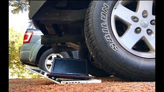 Jeep Wrangler runs over computers (SLOWMO)