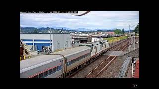 Unknown Amtrak train Passes Chehalis with bikers waving