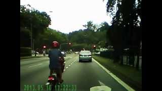 Ah Pek Cyclist trying to ride safe