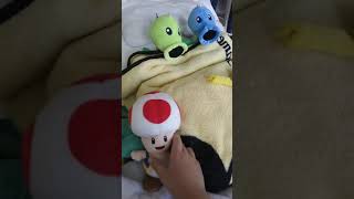 Plants versus zombie plush video on the bed