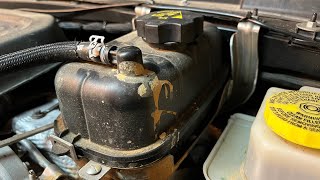 How to check the gas engine coolant level on a Jeep Wrangler 4XE