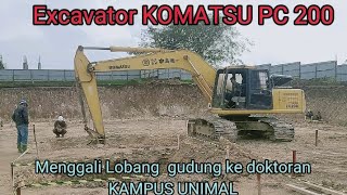 BEKO  KOMATSU PC 200"digging a hole in the UNIMAL Foudation of the north Aceh campus