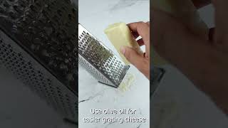 Use olive oil for easier grating cheese #howto #shorts #cooking #useful #lifehacks