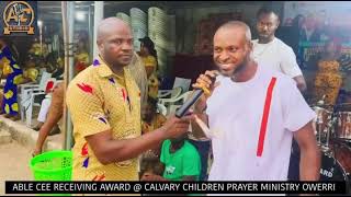 Able Cee Receiving Award @ Calvary Children Prayer Ministry Owerri