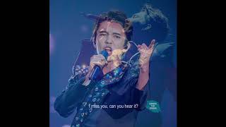 Dimash Kudaibergen singing "Okinish (Regret)" with photos of Dimash by GUMA