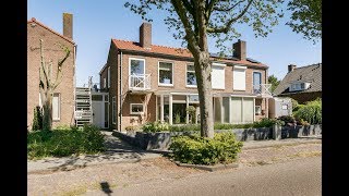 Fraai uitgebouwde tweekapper op gunstige locatie met garage en een leuke tuin, Wielstraat 8