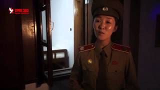 North Korean military guide sings at the "KPA Headquarters during Korean War"