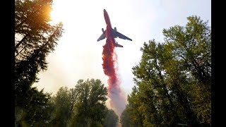 Тушение горящего военного арсенала самолетом , снято с высоты. Калиновка взрывы.