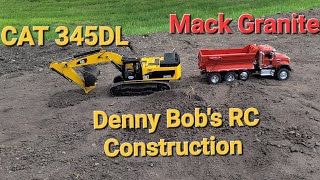 My RC CAT 345DL hydraulic excavator loading my Red Bruder Tamiya Mack and hauling to the trommel