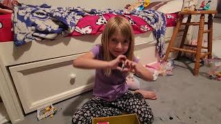 Scarlett opens Mystery Treasure Box #18 with Disney Legos, a princess, & the coolest stress ball!