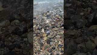 Waves on beach rock Salinas Ecuador