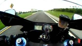 CBR 954 RR Smoking a GSXR 750 on a onramp.