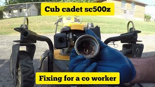 fixing a cub cadet sc500z for my coworker runs and stops