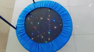 Light Up Playtime: Your Child's Dream 36-Inch Trampoline with LED Lights and Safety Handles!