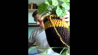 Crocheted window plant hanger for house plants or vegetables