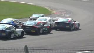 BRSCC with TCR UK 2024: Ginetta Junior race cars in action at Silverstone