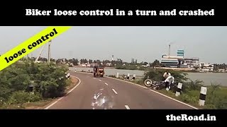 Biker looses control in a curve | loose control