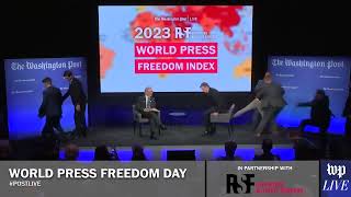 NEW - Protesters interrupt talk with Blinken, demand freedom for WikiLeaks' Julian Assange on World