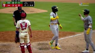 Oakland Athletics' Lawrence Butler hits 2nd home run of game over left field wall vs. Philadelphia