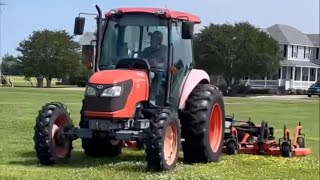 Kubota tractor with tri-deck finish  mower