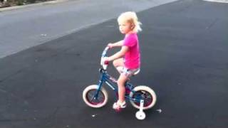 Emily is getting the feel for her new bike.