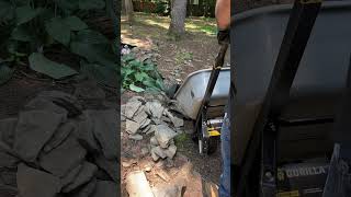 Moving rocks is way easier when you have a wheelbarrow. #nature #satisfying #landscaping #waterfall