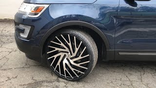 Ford Explorer on 24”AZA-505 gloss black machined wheels wrapped around 255/30-24 Lexani tires