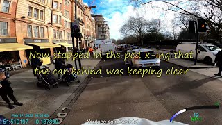 KN66EAK Cheeky driver filtering in a car. Crosses ASL. Stops inside pedestrian crossing lights.