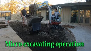 Using A Takeuchi TB216 To Dig Out Courtyard Areas