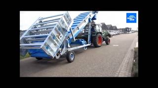 Транспортировка Выгружной Установки трактором. Transporting the Emptying Unit behind Tractor