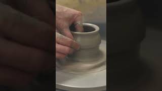 Wheel throwing clay cylinder for a pottery mug