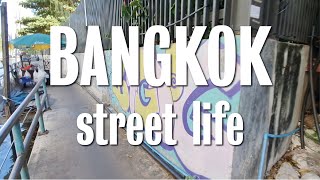 Streetlife in Bangkok. A walk though a back alley for authentic Thai life in the city centre