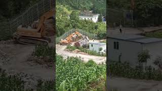 Excavator rescue failed   truck overturned