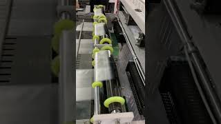 High-Speed Three-Lane T-Shirt Bag Making Machine in Action - Boost Your Production Efficiency!