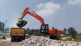 Blue Metal recycling in India with a BF90.3 crusher bucket