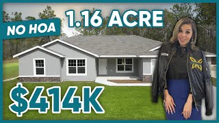 Move into a Brand New Florida Home on OVER ONE ACRE with NO HOA AND NO CARPETS!