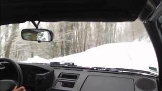 Toyota MR2 AW11 snow driving on road.